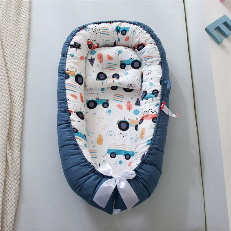 magnifique reducteur de lit garcon a offrir pour une jeune maman