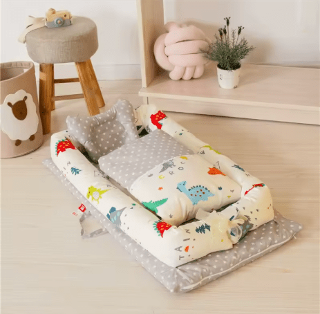 Matelas à langer avec coussin moelleux | Cocon Portable - Palais De Bébé