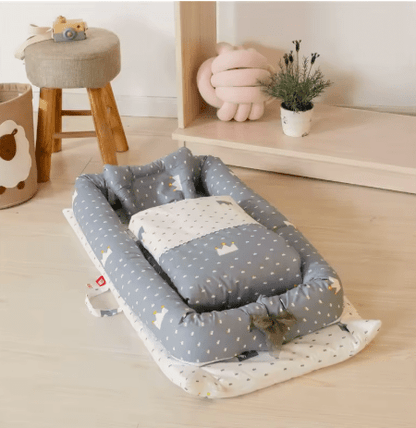 Matelas à langer avec coussin moelleux | Cocon Portable - Palais De Bébé
